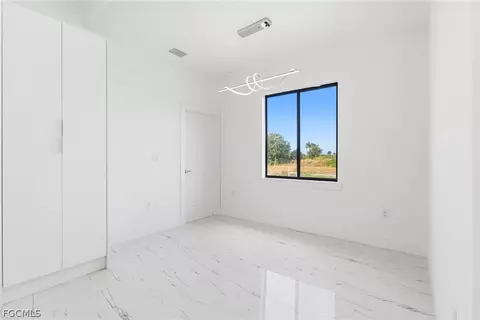 Bedroom - 321 Peerless St, Lehigh Acres, FL 33974 photo 7 of 9