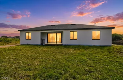 Exterior - 321 Peerless St, Lehigh Acres, FL 33974 photo 4 of 9