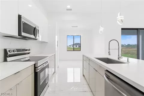 Kitchen - 321 Peerless St, Lehigh Acres, FL 33974 photo 2 of 7