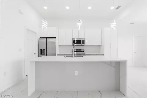 Kitchen - 321 Peerless St, Lehigh Acres, FL 33974 photo 7 of 7