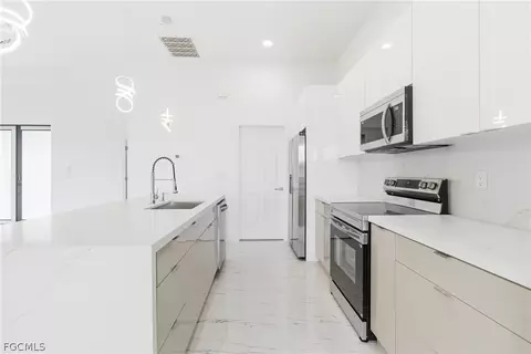 Kitchen - 321 Peerless St, Lehigh Acres, FL 33974 photo 1 of 7