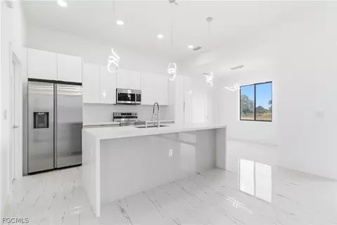 Kitchen - 321 Peerless St, Lehigh Acres, FL 33974 photo 4 of 7