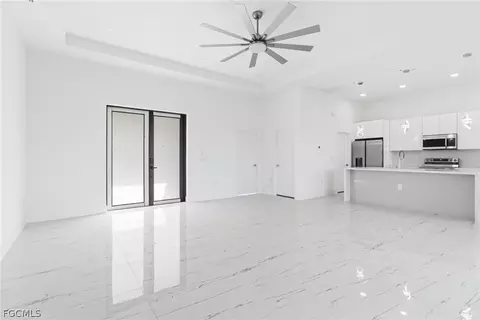 Living - 321 Peerless St, Lehigh Acres, FL 33974 photo 2 of 3