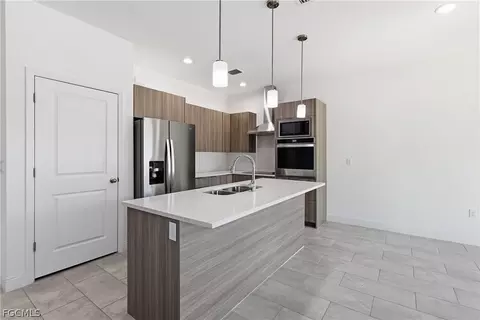 Kitchen - 1300 E Bucknell Ln, Labelle, FL 33935 photo 2 of 3