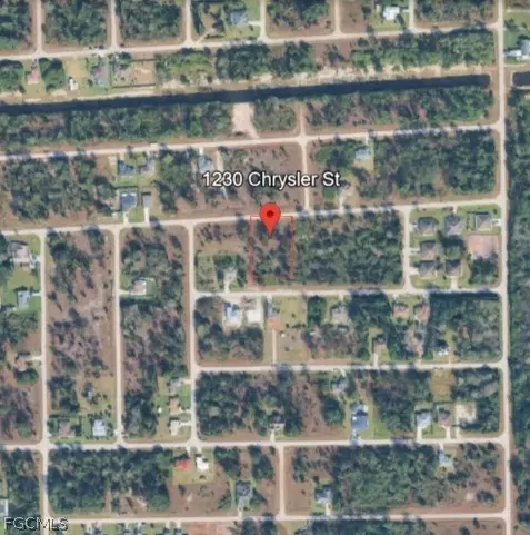 1230 Chrysler St, Lehigh Acres, FL 33974