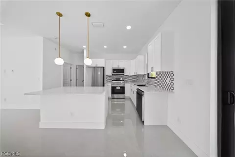 Kitchen - 205 E 15th St, Lehigh Acres, FL 33972 photo 2 of 6