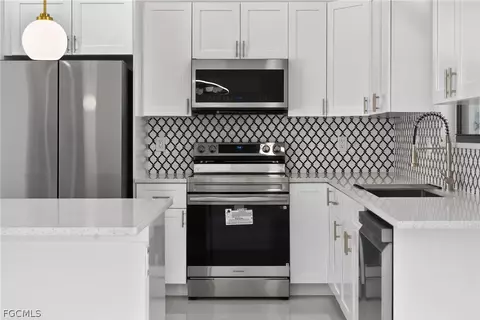 Kitchen - 205 E 15th St, Lehigh Acres, FL 33972 photo 3 of 6