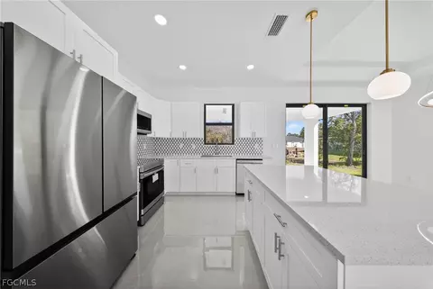 Kitchen - 205 E 15th St, Lehigh Acres, FL 33972 photo 4 of 6