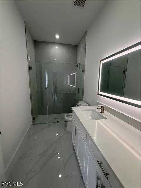 Bath - 1607 E 14th St, Lehigh Acres, FL 33972 photo 2 of 2