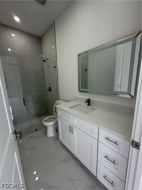 Bath - 1607 E 14th St, Lehigh Acres, FL 33972 photo 1 of 2