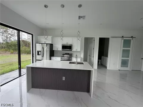 Kitchen - 1607 E 14th St, Lehigh Acres, FL 33972 photo 1 of 2
