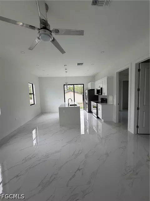 Kitchen - 1607 E 14th St, Lehigh Acres, FL 33972 photo 2 of 2