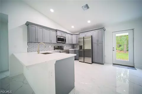Kitchen - 824 Carpenter St E, Lehigh Acres, FL 33974 photo 1 of 3