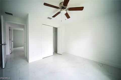 Bedroom - 824 Carpenter St E, Lehigh Acres, FL 33974 photo 2 of 2