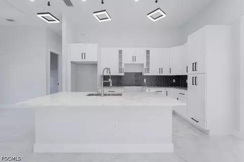 Kitchen - 1504 E 6th St, Lehigh Acres, FL 33972 photo 3 of 3