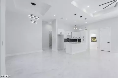 Living - 1504 E 6th St, Lehigh Acres, FL 33972 photo 4 of 5