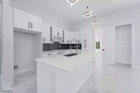 Kitchen - 1504 E 6th St, Lehigh Acres, FL 33972 photo 1 of 3