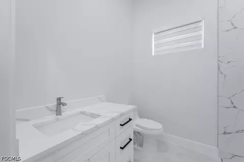 Bath - 1504 E 6th St, Lehigh Acres, FL 33972 photo 2 of 3