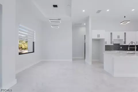 Living - 1504 E 6th St, Lehigh Acres, FL 33972 photo 2 of 5