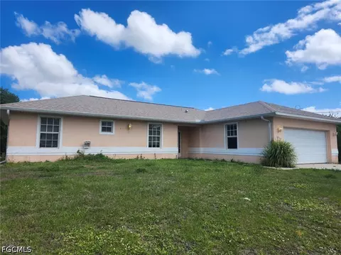 1055 Peach St, Lehigh Acres, FL 33974