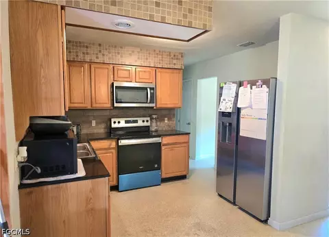Kitchen - 4357 23rd Ave SW, Naples, FL 34116 photo 2 of 2