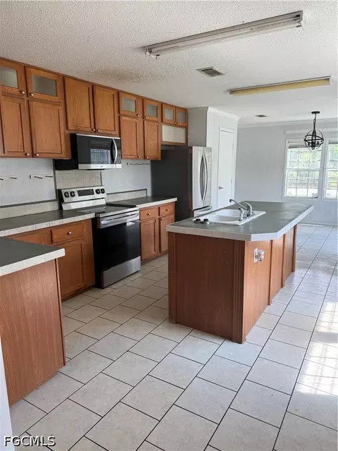 1660 Evans Rd, Labelle, FL 33935 photo 2