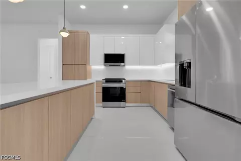 Kitchen - 2804 5th St W, Lehigh Acres, FL 33971 photo 3 of 3