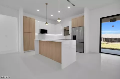 Kitchen - 2804 5th St W, Lehigh Acres, FL 33971 photo 2 of 3