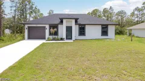 457 Woodman Dr, Lehigh Acres, FL 33972