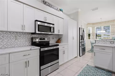 Kitchen - 20700 Persimmon Pl, Estero, FL 33928 photo 6 of 6