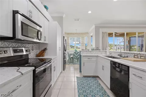 Kitchen - 20700 Persimmon Pl, Estero, FL 33928 photo 4 of 6