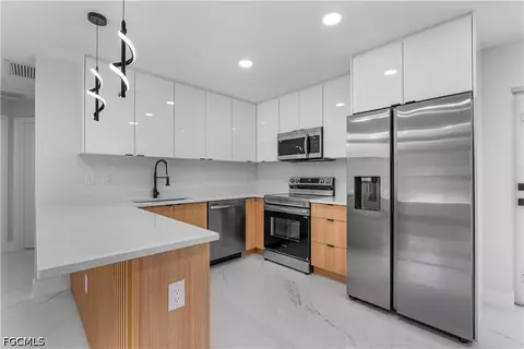 Kitchen - 940 Berg St E, Lehigh Acres, FL 33974 photo 1 of 2