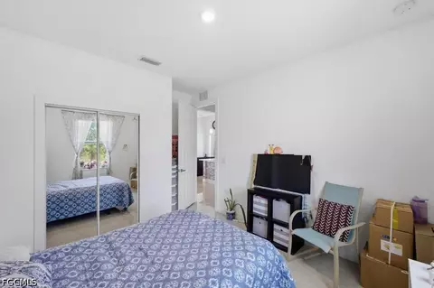 Bedroom - 1211 Eclat St E, Lehigh Acres, FL 33974 photo 3 of 5
