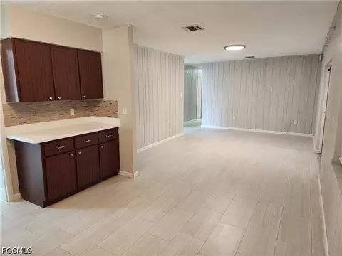 Living - 111 E Sugarland Cir, Clewiston, FL 33440 photo 1 of 4