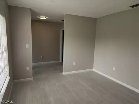 Living - 111 E Sugarland Cir, Clewiston, FL 33440 photo 4 of 4