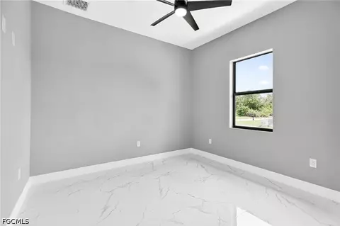Bedroom - 1114 Bari St E, Lehigh Acres, FL 33974 photo 2 of 3