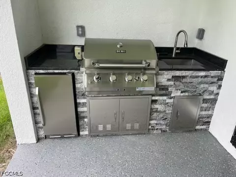 Kitchen - 1114 Bari St E, Lehigh Acres, FL 33974 photo 8 of 8