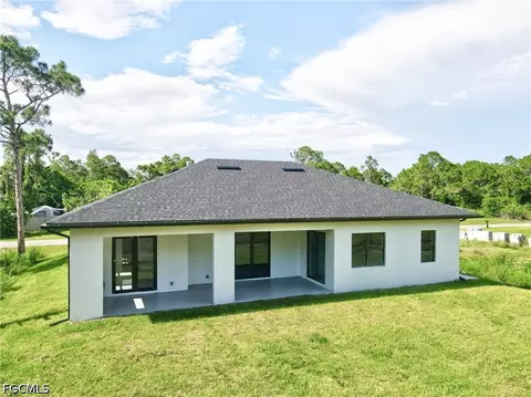 Exterior - 1114 Bari St E, Lehigh Acres, FL 33974 photo 4 of 7