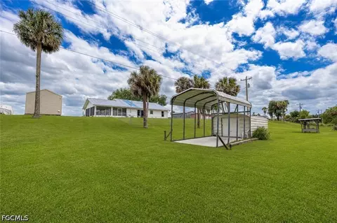 Exterior - 1159 Lock Ln, Moore Haven, FL 33471 photo 3 of 9