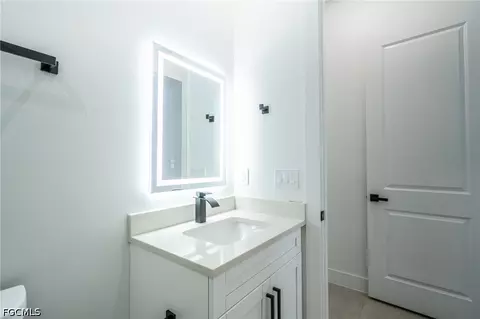 Bath - 1142 Eclipse St E, Lehigh Acres, FL 33974 photo 2 of 11