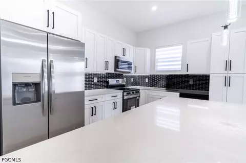 Kitchen - 1142 Eclipse St E, Lehigh Acres, FL 33974 photo 5 of 5