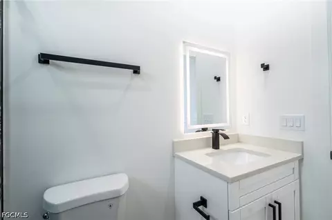 Bath - 1142 Eclipse St E, Lehigh Acres, FL 33974 photo 6 of 11