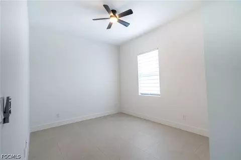 Bedroom - 1142 Eclipse St E, Lehigh Acres, FL 33974 photo 7 of 11