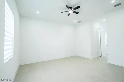 Bedroom - 1142 Eclipse St E, Lehigh Acres, FL 33974 photo 10 of 11
