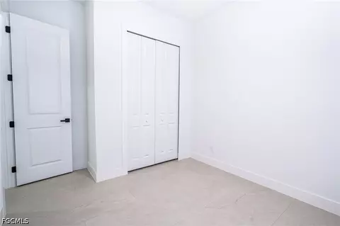 Bedroom - 1142 Eclipse St E, Lehigh Acres, FL 33974 photo 1 of 11