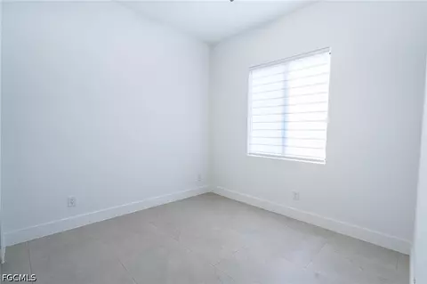Bedroom - 1142 Eclipse St E, Lehigh Acres, FL 33974 photo 2 of 11