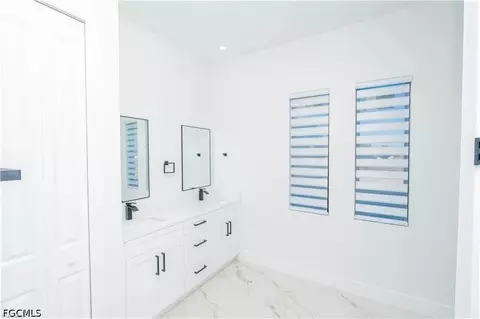Bath - 1142 Eclipse St E, Lehigh Acres, FL 33974 photo 3 of 4
