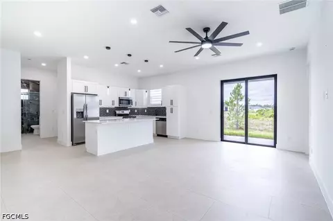Living - 1142 Eclipse St E, Lehigh Acres, FL 33974 photo 2 of 3