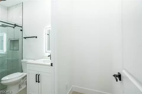 Bath - 1142 Eclipse St E, Lehigh Acres, FL 33974 photo 1 of 11