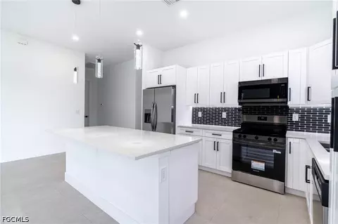 Kitchen - 1142 Eclipse St E, Lehigh Acres, FL 33974 photo 3 of 5